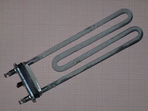 A washing machine heating element coated in limescale